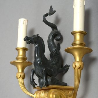 Set of four bronze and gilt-bronze wall-lights