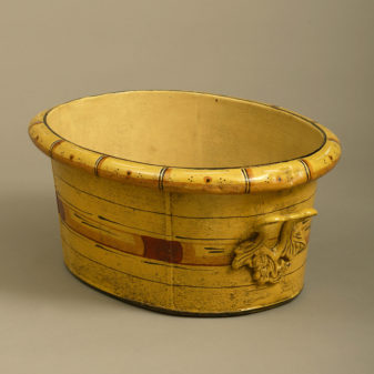 A 19th century tole planter with faux bamboo decoration