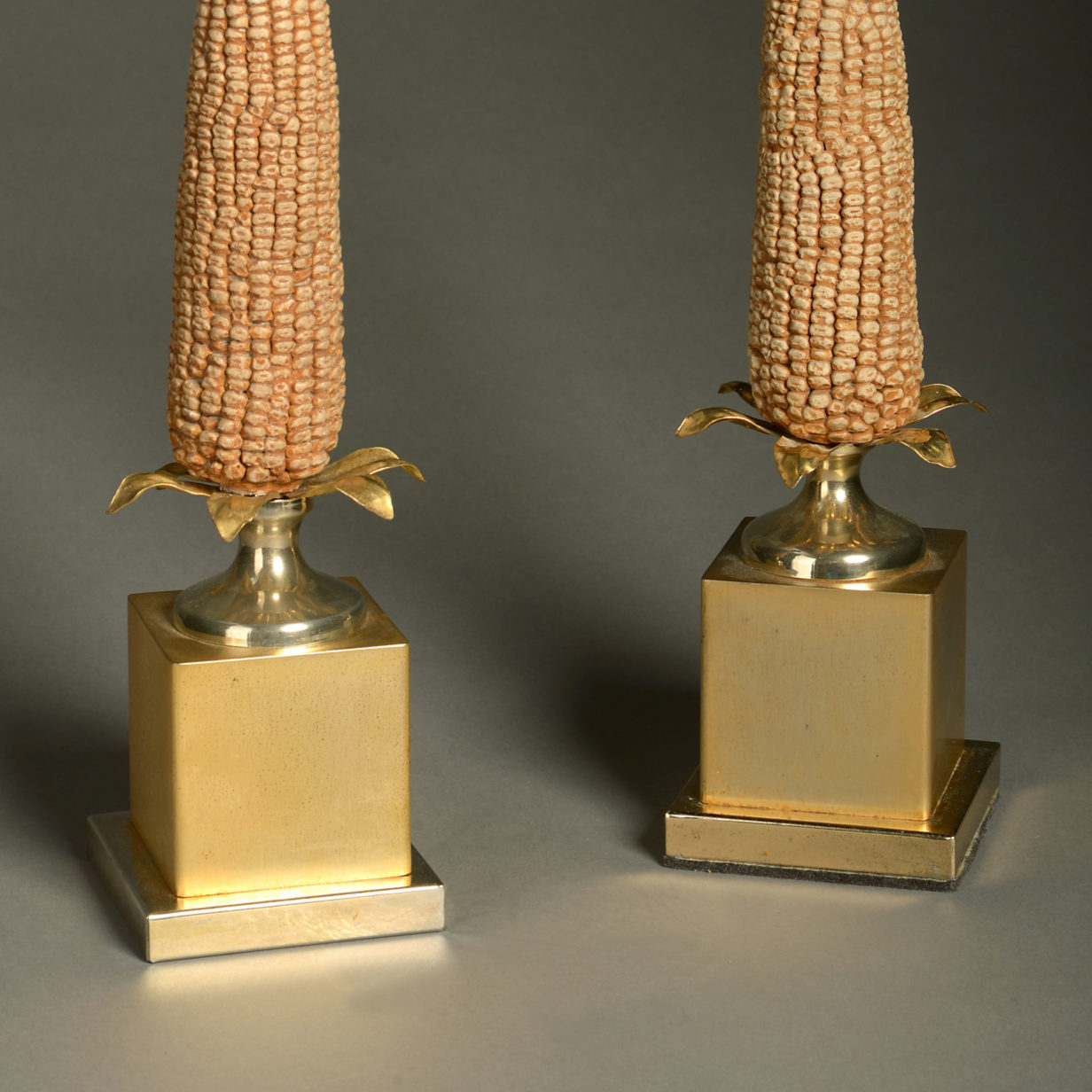 A pair of mid-century lamps - manner of maison charles