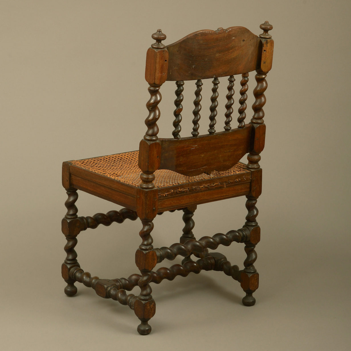An early 18th century pair of cape dutch stinkwood chairs