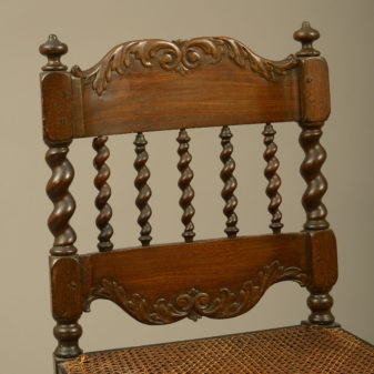 An early 18th century pair of cape dutch stinkwood chairs