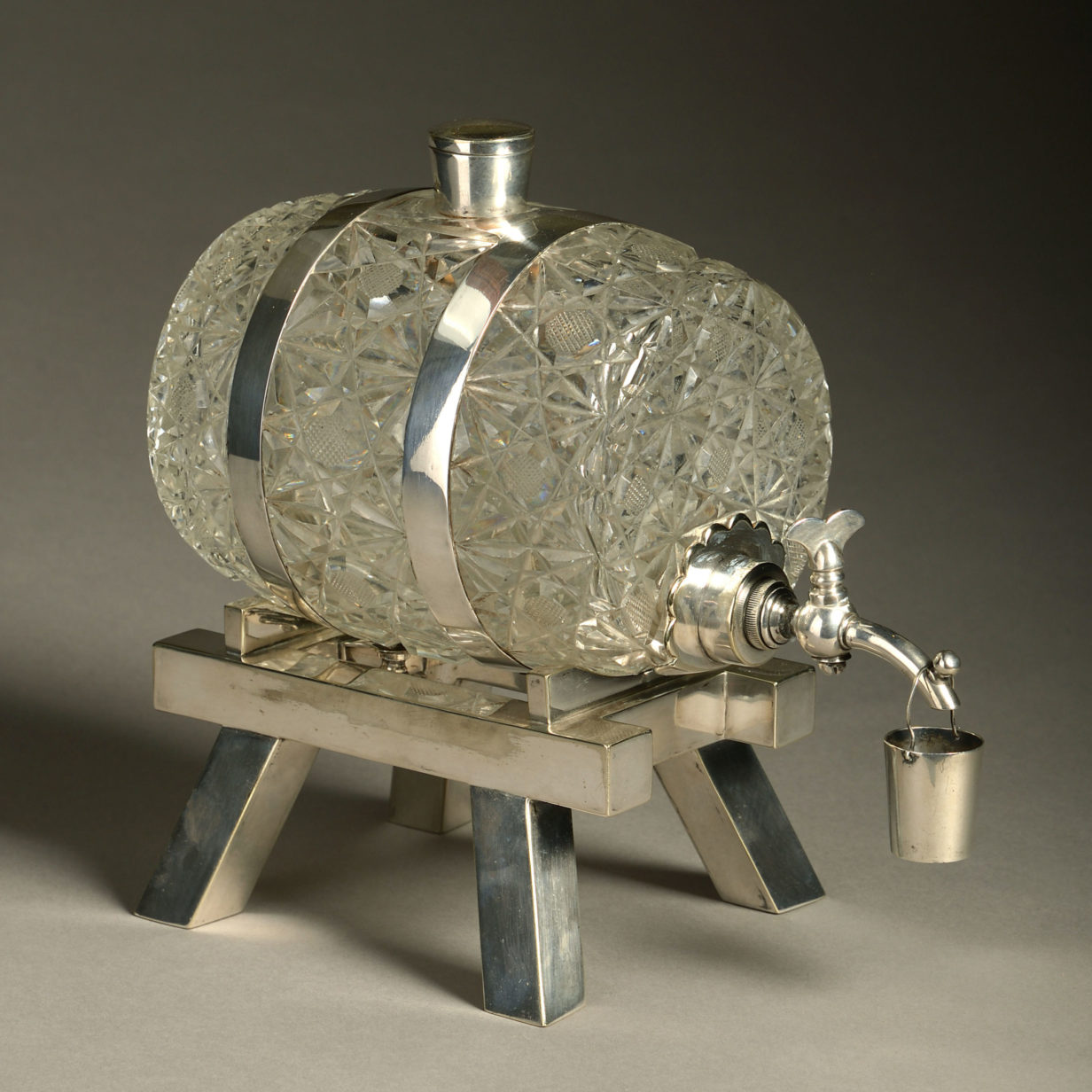 An early 20th century cut glass novelty spirit barrel