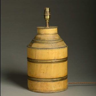 A yellow ochre painted tole canister table lamp