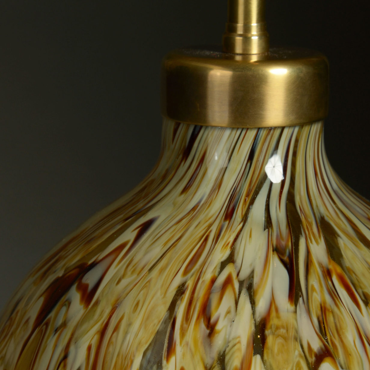 A mid-century modern glass vase lamp