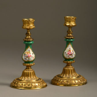 A 19th Century Pair of Sevres and Ormolu Candlesticks