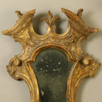 A pair of 18th century venetian giltwood girandole mirrors