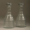 A pair of regency period cut glass decanters
