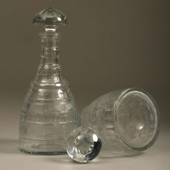 A pair of regency period cut glass decanters
