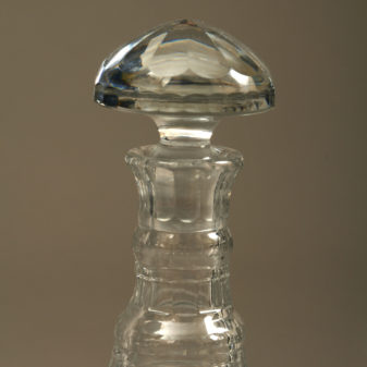 A pair of regency period cut glass decanters