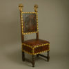 A 17th century florentine parcel gilded walnut chair