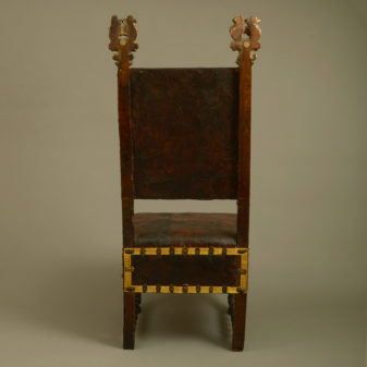 A 17th century florentine parcel gilded walnut chair