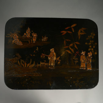 An early 19th century regency japanned occasional table