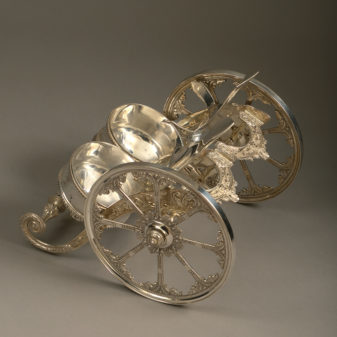 A mid-20th century silvered champagne bottle carriage