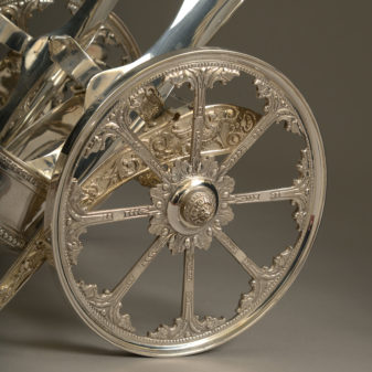 A mid-20th century silvered champagne bottle carriage