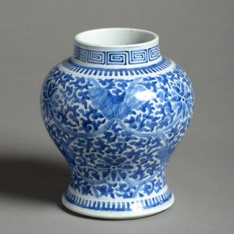 A 19th century blue and white kangxi style porcelain vase