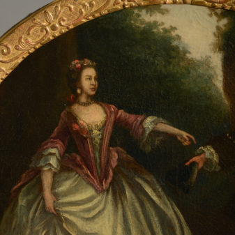 An 18th century over door double portrait