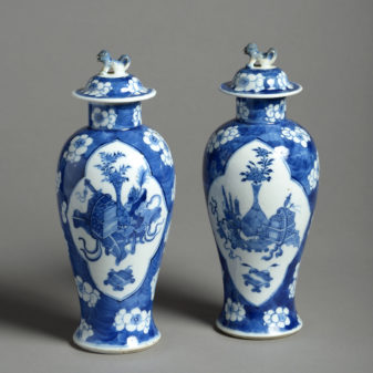 A 19th century pair of blue and white porcelain vases