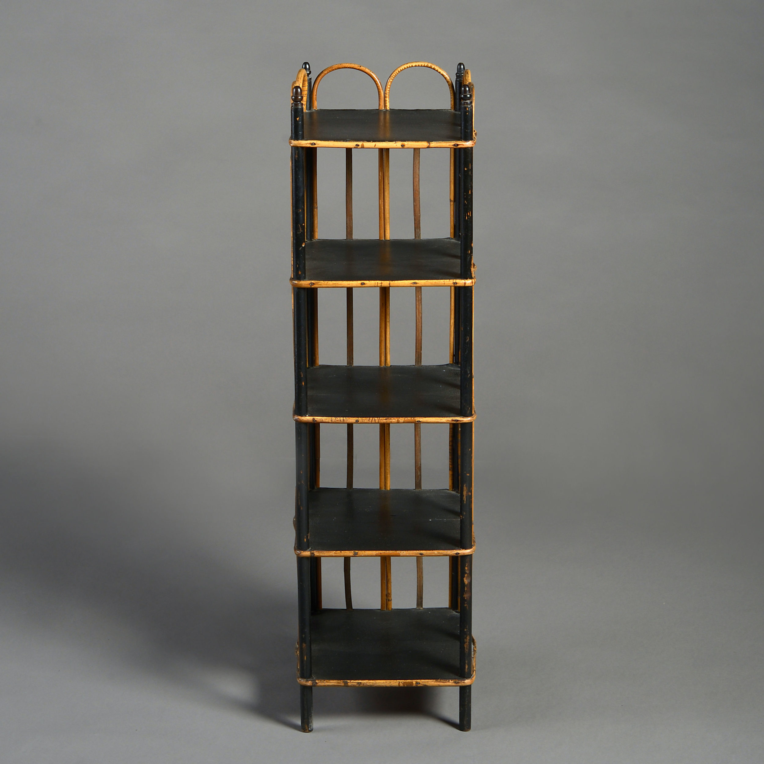 A mid 19th century victorian bamboo shoe rack A mid 19th century victorian bamboo shoe rack