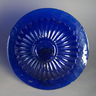 A 19th century bristol blue glass charger