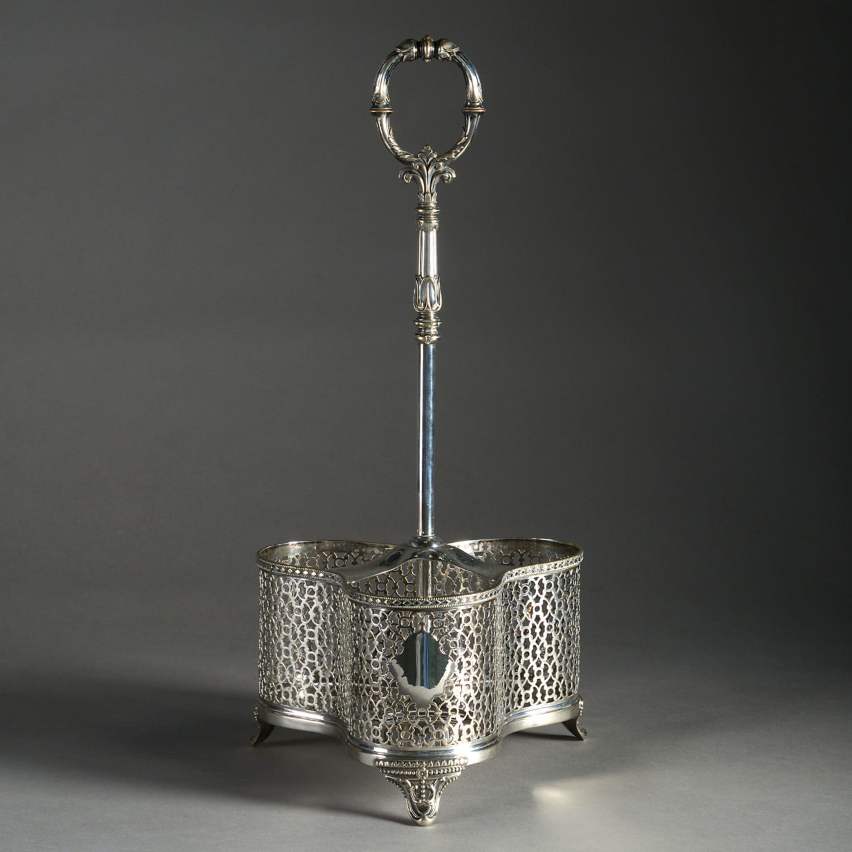 A 19th Century Silvered Bottle Carrier and Three Coloured Glass Cordial Bottles with a Silvered Carrier.