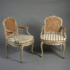 A pair of 19th century rococo revival armchairs in the louis xv taste