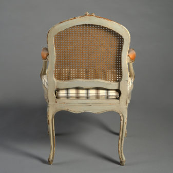A pair of 19th century rococo revival armchairs in the louis xv taste