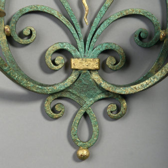 Mid-century patinated and gilt iron wall light after gilbert poillerat