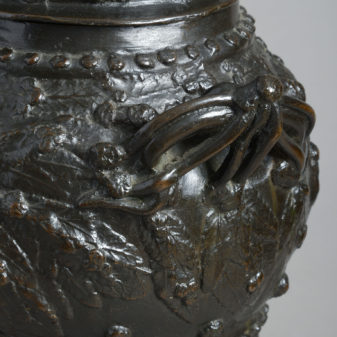 A pair of large bronze lidded vases