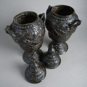 A pair of large bronze lidded vases