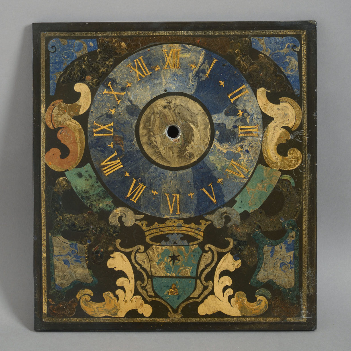 A rare early 18th century italian scagliola clock-face panel
