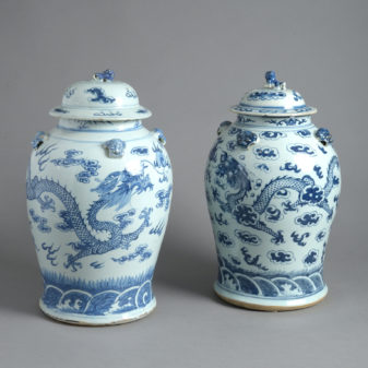 A Close Pair of Chinese Blue and White Porcelain Covered Jars or 'Temple Jars'