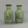 A pair of turquoise ground famille rose vases