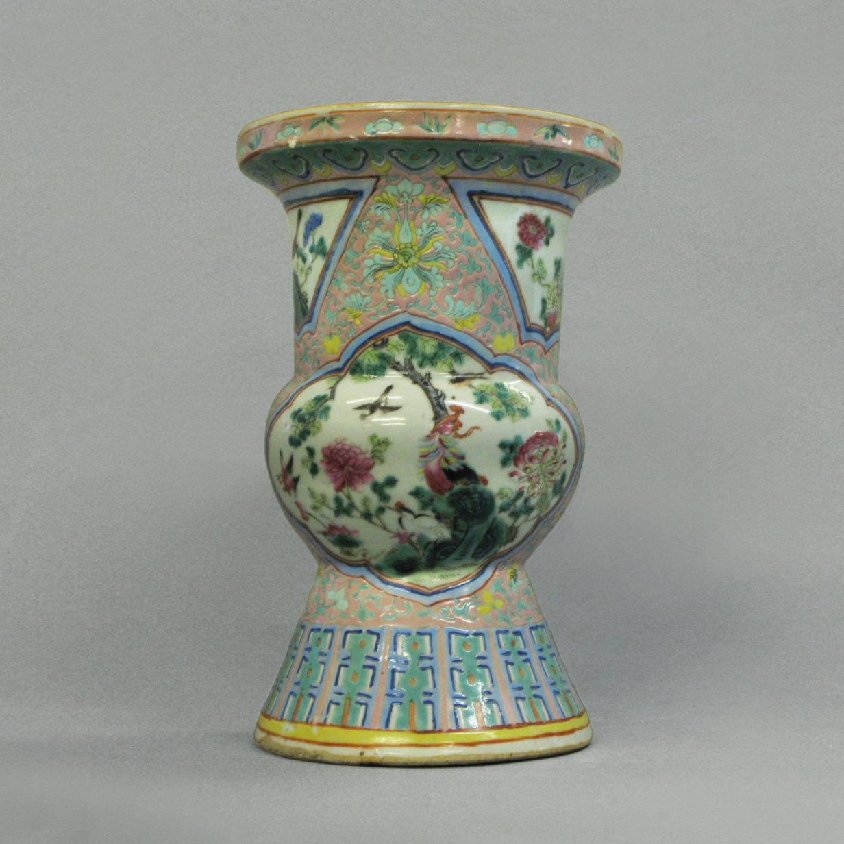 A qing dynasty famille rose beaker vase