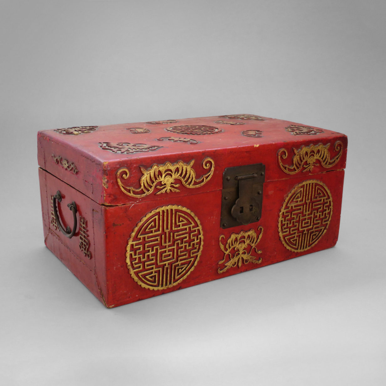 A red lacquer and gilt casket