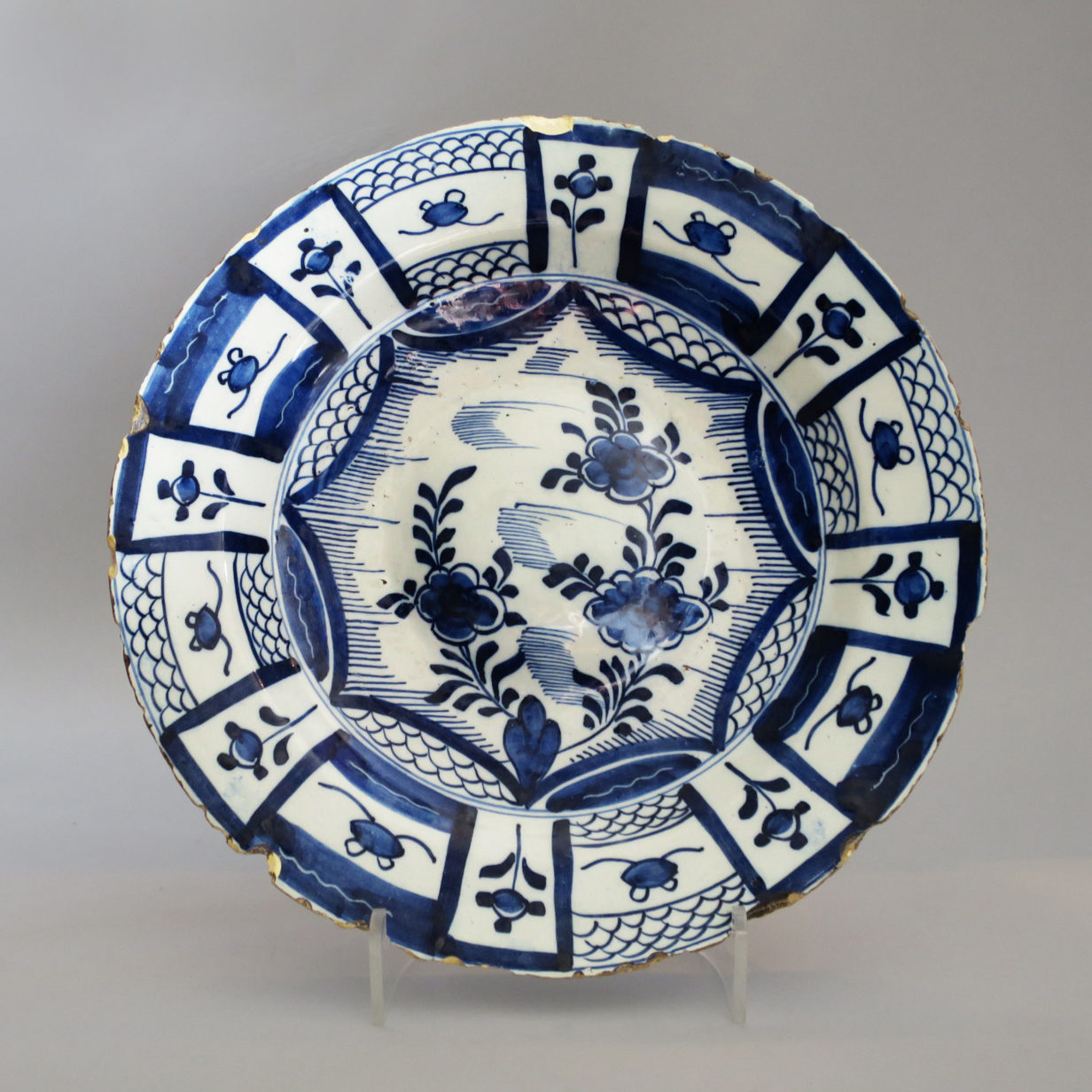A blue and white delft charger