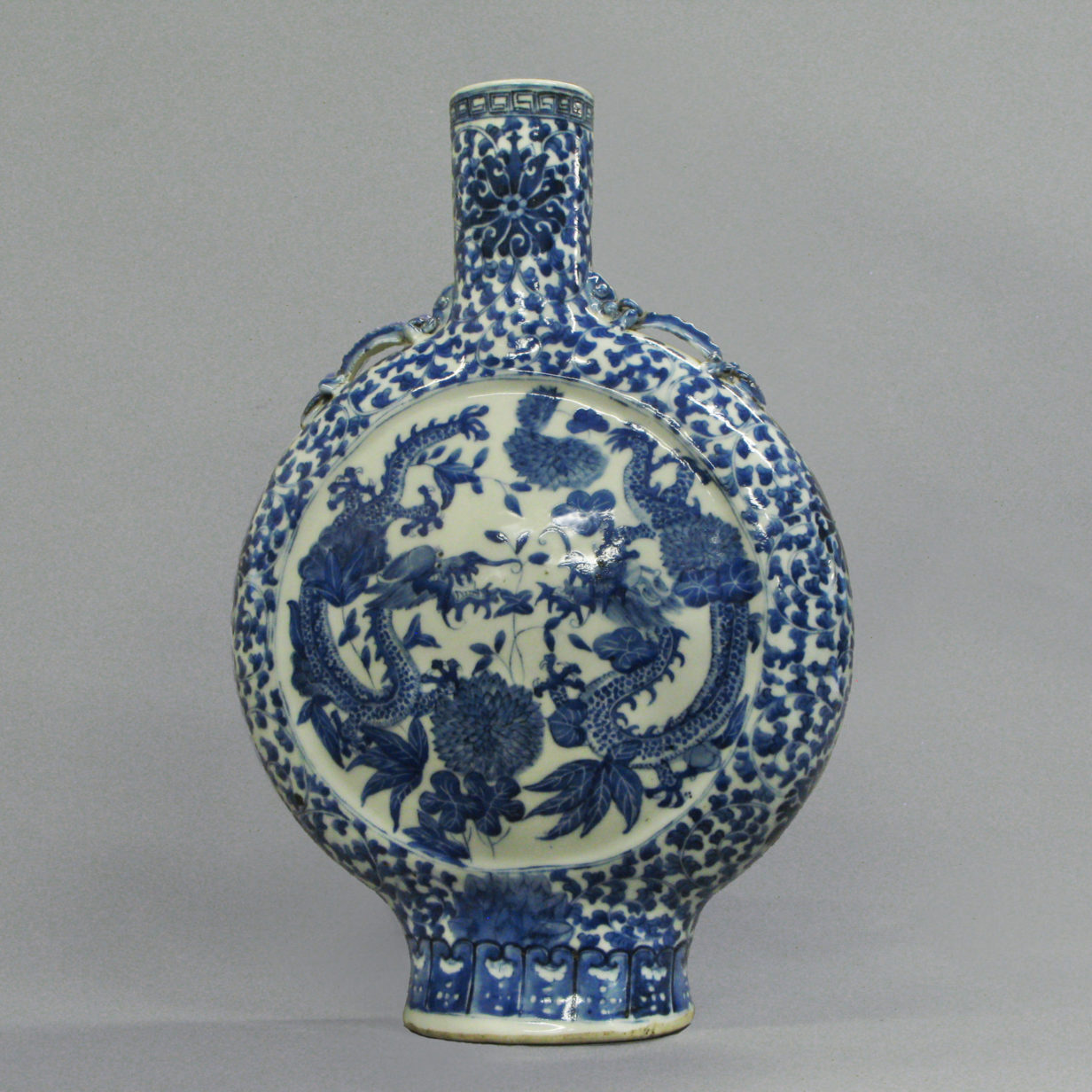 A blue and white porcelain moon flask