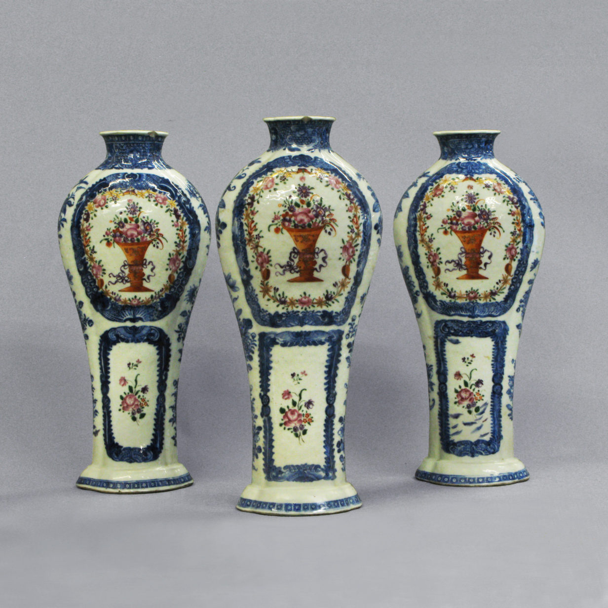 A set of three qing dynasty famille rose vases