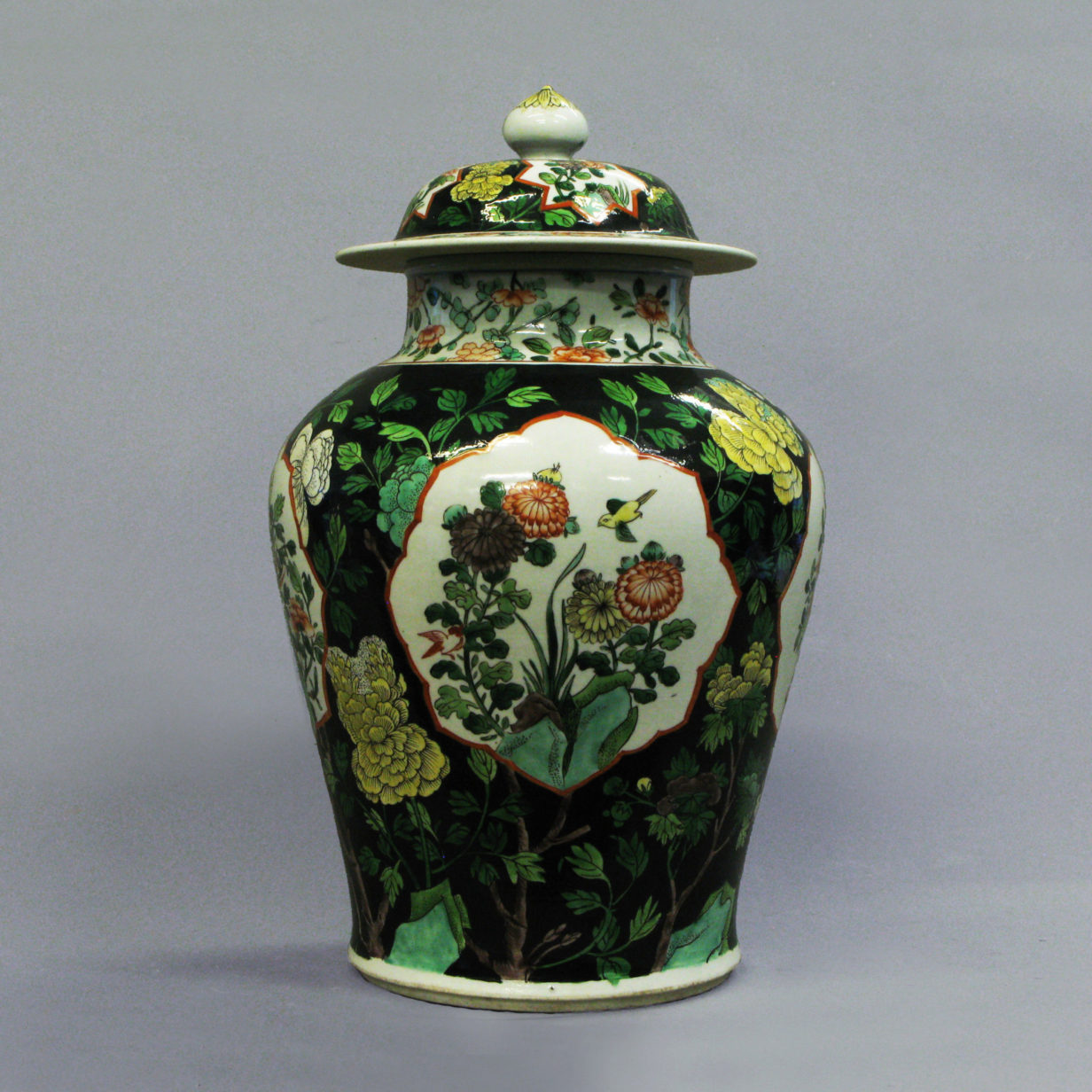 A famille noire vase and cover