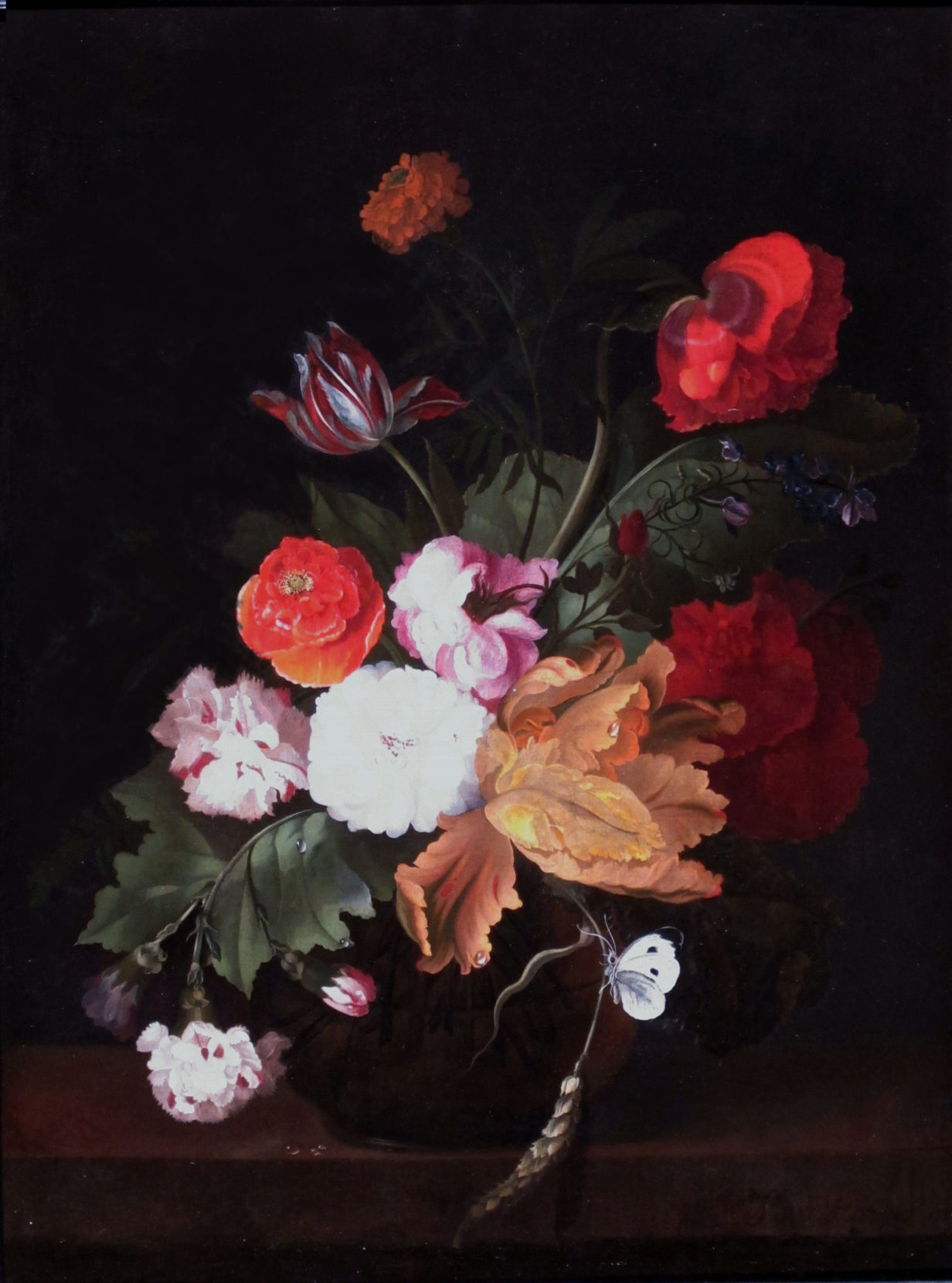 Manner of van huysum - an 18th century still life oil of mixed flowers in a glass vase