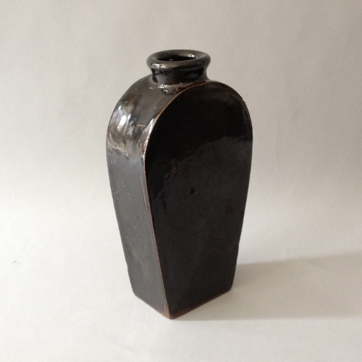 A Black Glazed Chinese Pottery Bottle