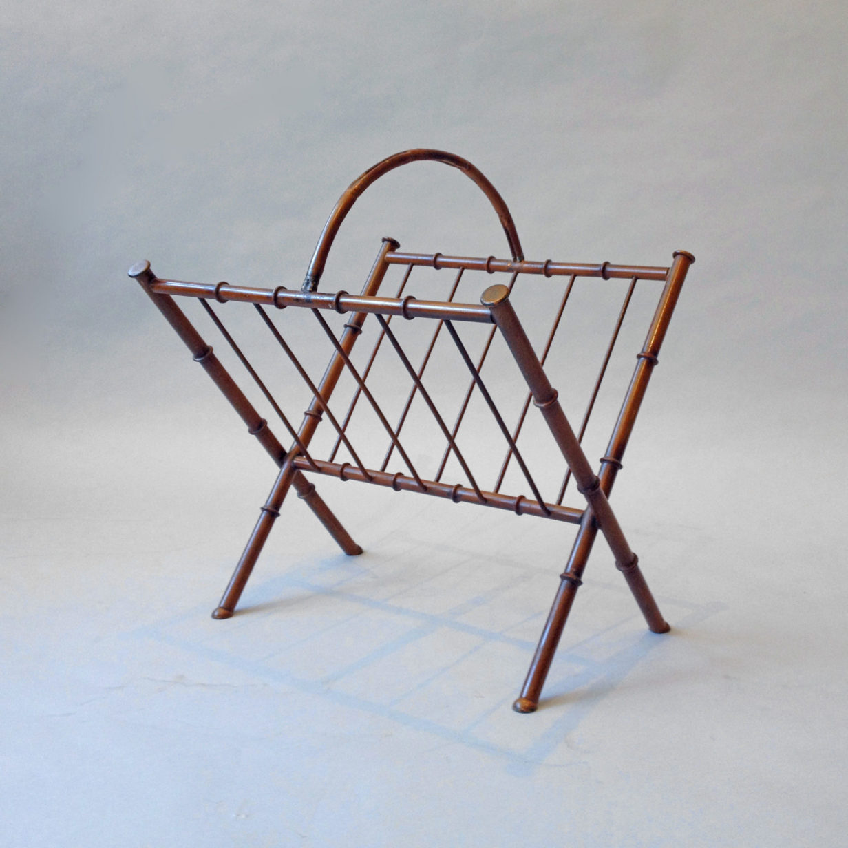 A faux bamboo magazine rack