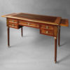 A 19th century louis xvi style mahogany writing desk
