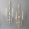 A large pair of adam revival carved and painted wall lights
