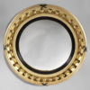 A very large early 19th century regency period convex mirror