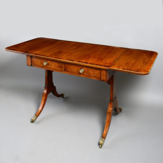 An unusually small late 18th century mahogany sofa table