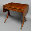 An unusually small late 18th century mahogany sofa table