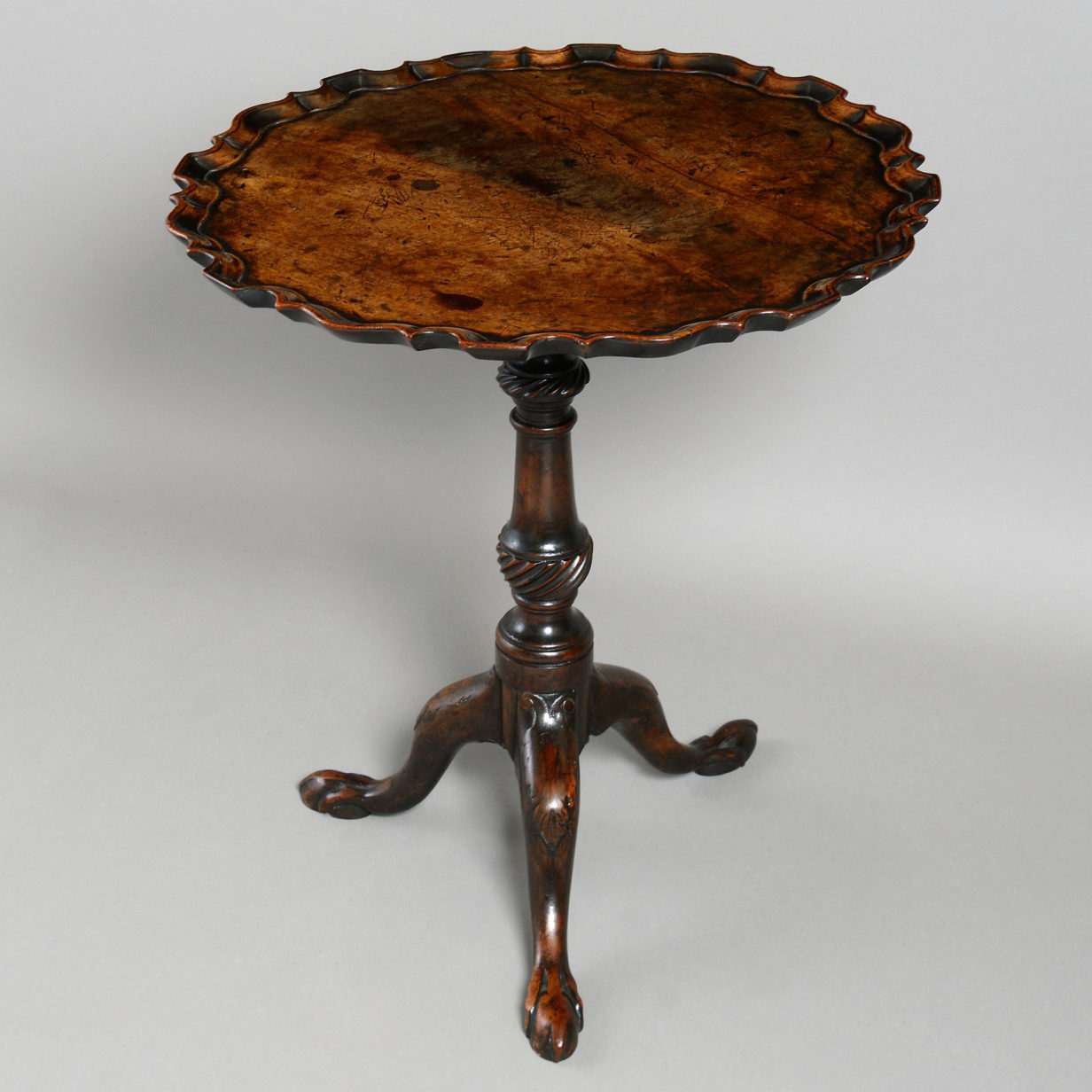 An 18th century george iii pie crust tripod table