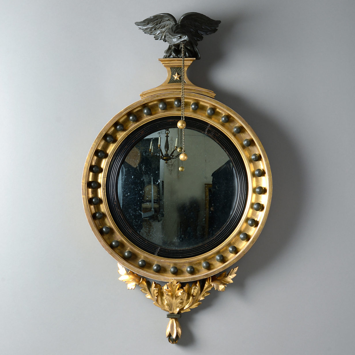 A 19th century regency period convex mirror