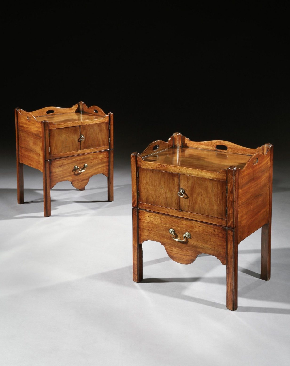 A near pair of george iii mahogany bedside cabinets