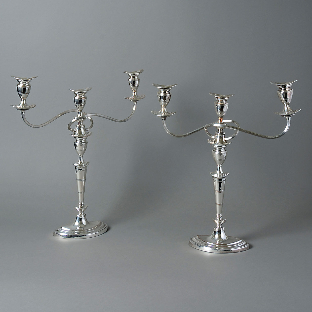A pair of 18th century sheffield plate candelabra